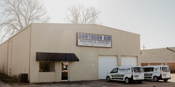 Southern Air Heating & Cooling commercial building with service vehicles parked outside in Monroe.
